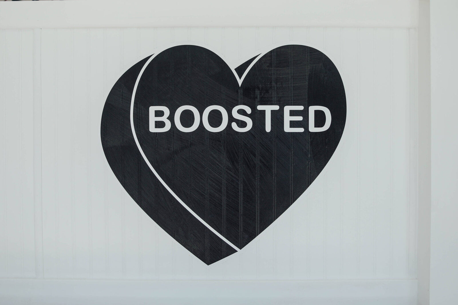 The BOOSTED heart painted on the wall inside the Manayunk shop