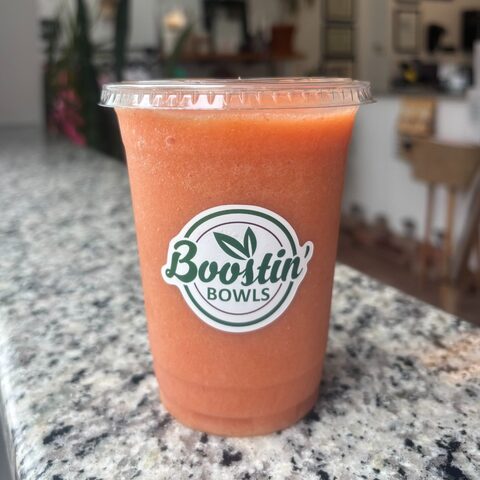 Sunshine Sip Smoothie of orange juice, strawberries, mango and banana
